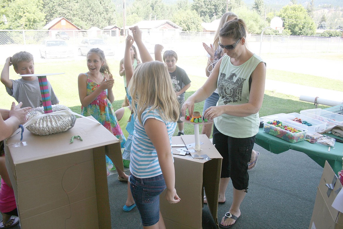 &lt;p&gt;Students at the summer arts camp in St. Regis celebrate the success of their project.&lt;/p&gt;