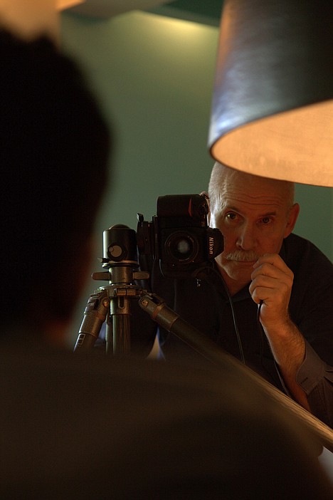 <p>Photographer Steve McCurry takes a photo of a Bollywood actor in Mumbai, India, with the last Kodachrome roll. Betting its future on digital photography, Kodak discontinued the slide and motion-picture film with a production run last August in which a master sheet nearly a mile long was cut up into more than 20,000 rolls. McCurry requested the final 36-exposure strip. After ninr months of planning, he embarked in June on a six-week odyssey. Trailing him was a TV crew from National Geographic Channel, which plans to broadcast a one-hour documentary early next year.</p>