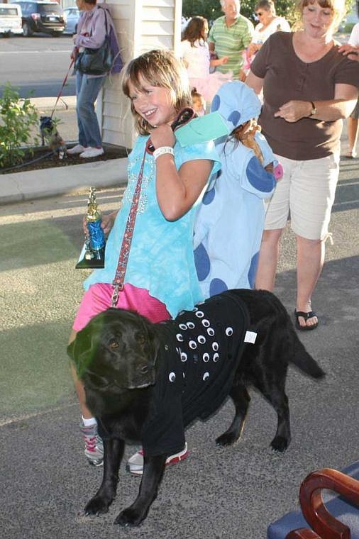 Ryann Harrington and her &#147;Seeing Eye Dog&#148; Zoey who won our junior division Creative Canine Costume award in 2012.