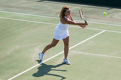 &lt;p&gt;Tracy Carlsen, of Hayden, returns the ball during a match on the court at the Coeur d&#146;Alene Resort Golf Course.&lt;/p&gt;