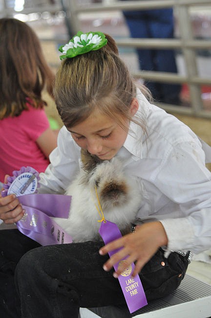 &lt;p&gt;Megan Evelo is thrilled with her Reserve Champion Jr. Showmanship award in the rabbit show.&lt;/p&gt;