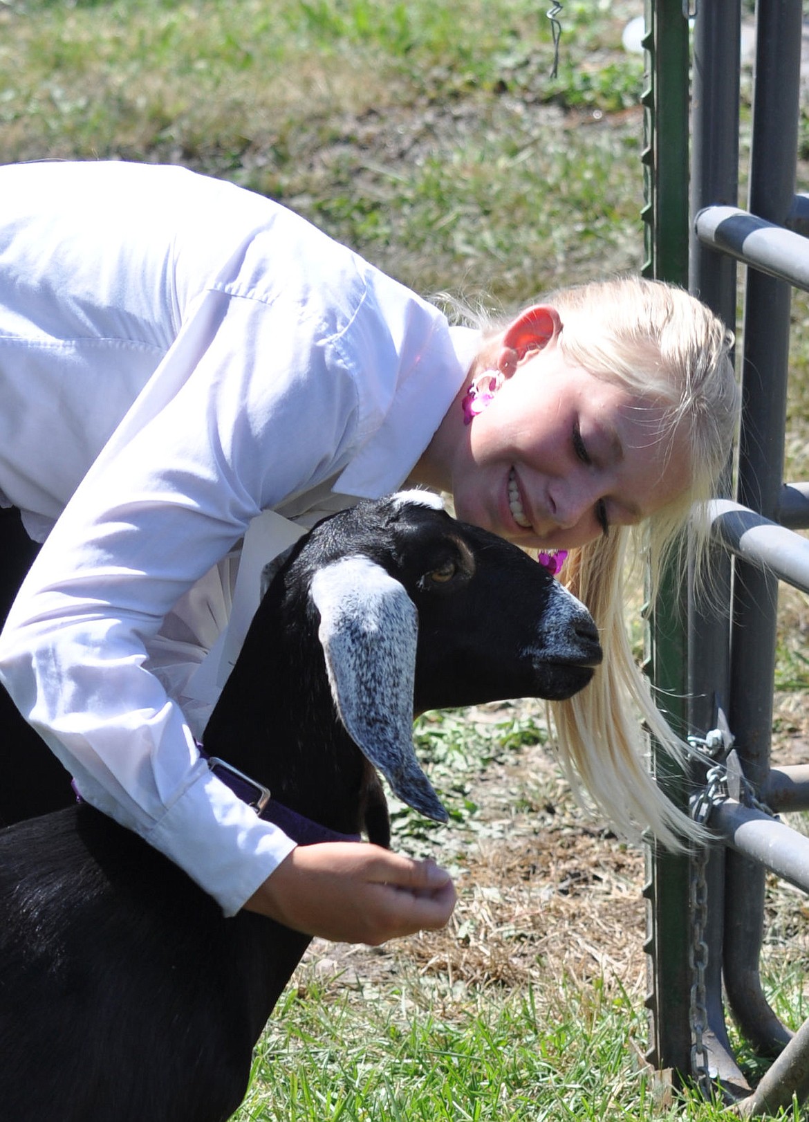 &lt;p&gt;Adriana Johnson gives her goat some advice before the Jr. Showmanship Round Robin event.&lt;/p&gt;