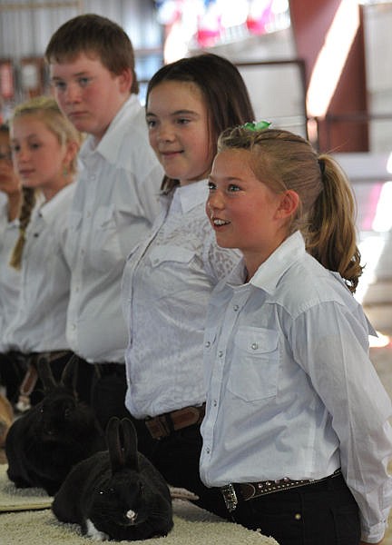 &lt;p&gt;Contestants in the Jr. Rabbit Showmanship competition listen carefully as the judge gives feedback and advice.&lt;/p&gt;