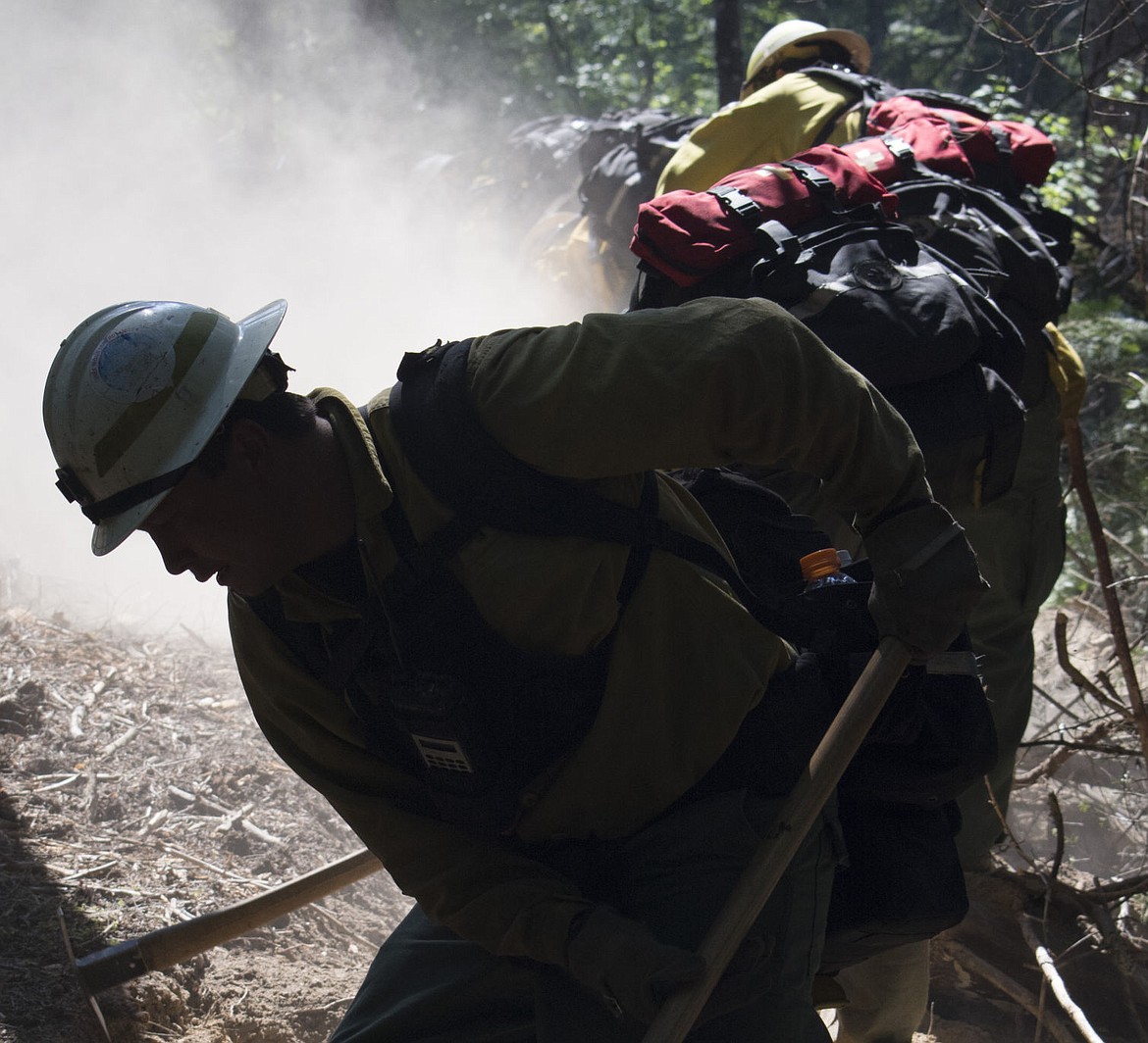 &lt;p&gt;Chief Mountain hotshots dig a hand line on Thursday afternoon near the old Silver King mine to establish a direct water line to the fire, which was a few hundred feet away.&lt;/p&gt;