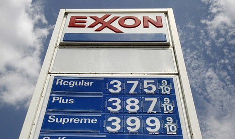 &lt;p&gt;Gasoline prices are listed on a marquis at an Exxon station in Greentree, Pa., on July 26.&lt;/p&gt;