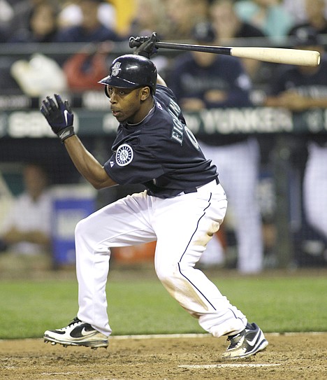 &lt;p&gt;Seattle's Chone Figgins hits a two-run double in the sixth inning Friday night. The Mariners defeated the visiting Kansas City Royals 7-1.&lt;/p&gt;