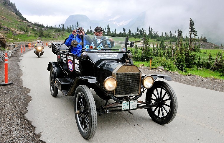 A Model T drives up the last half mile toward the Logan Pass Visitor Center Tuesday morning in Glacier National Park. About 175 of the antique vehicles are in the Flathead Valley this week as part of the Montana Majestic Mountain T Tour.