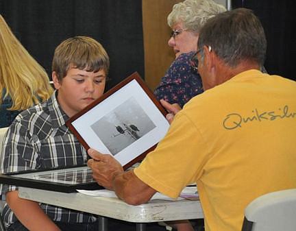 &lt;p&gt;Dalen Siech listens intently as the photography judge comments on his fabulous photographs.&lt;/p&gt;