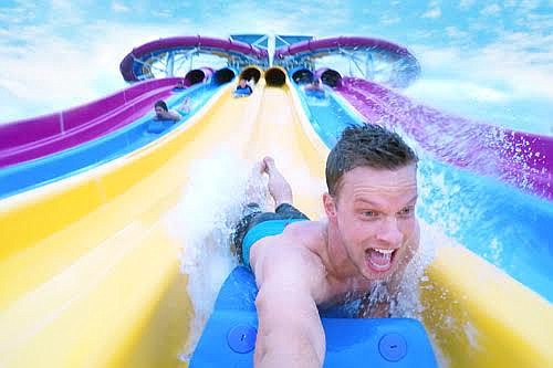 A young man roars down the new Riptide Racer, which sends individuals down 400-feet of tube.