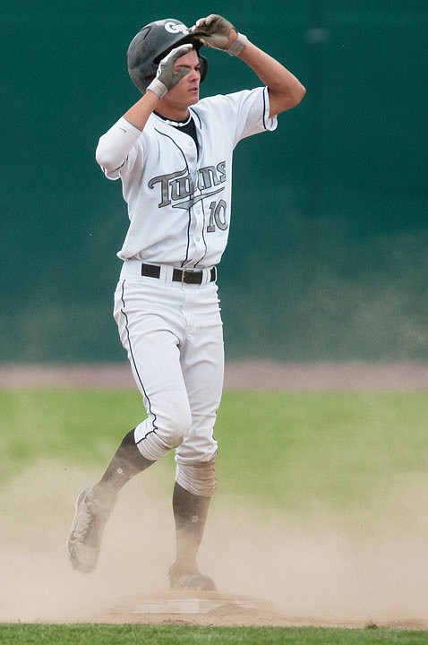 <p> After a force out at second, Glacier Twins' Bryce Wehrli (10) looks on as the Billings Scarlets complete a double play Thursday afternoon during the Twins' loss in the Class AA State Tournament at Memorial Field. </p>