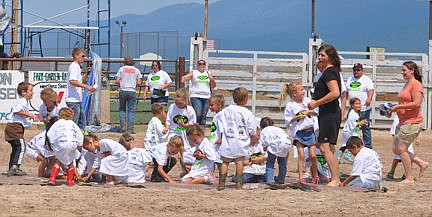 &lt;p&gt;A few moms find their kids after finding their shoes during the kid scramble.&lt;/p&gt;