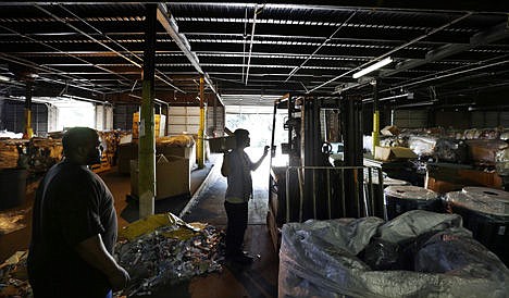 &lt;p&gt;TerraCycle Inc. founder Tom Szaky stops to talk with workers in a warehouse loaded with trash to be recycled Tuesday in Trenton, N.J. TerraCycle Inc. founder Tom Szaky stops to talk with workers in a warehouse loaded with trash to be recycled Tuesday in Trenton, N.J.&lt;/p&gt;