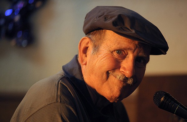 &lt;p&gt;Sandy Sanderson of Company Brass looks up and smiles while playing the piano at a North End Swing dance on Friday, July 20, in Kalispell. The dance organizers were excited to have their first live band play for one of their weekly dances.&lt;/p&gt;