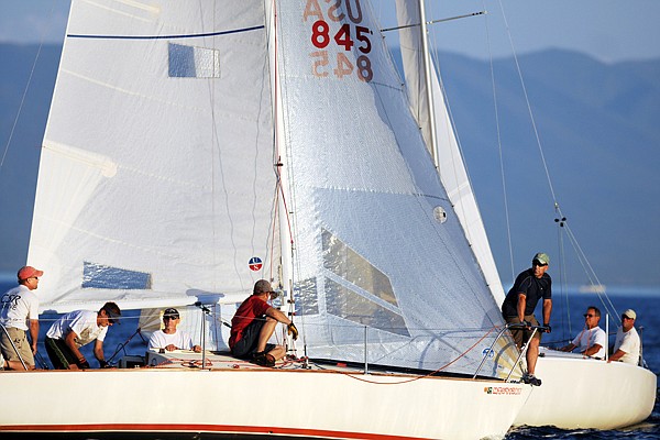 Tim Faurer, left to right, Vern Streeter, Randy Finch, Dave Johnson and Chris Sturdevent, all of Billings, watch and wait for the sound horn that signals the start of their race on Friday evening out on Flathead Lake. The crew of Joy Ride came in second place in the B Class races that evening.