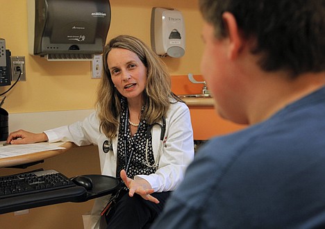 &lt;p&gt;Dr. Sarah de Ferranti, director of preventive cardiology at Boston Children's Hospital, left, meets with patient Quinn Voccio, 14, of Newton, Mass., right, in Waltham, Mass., Tuesday, Aug. 7, 2012. A government study shows that in the past decade, the proportion of children who have high cholesterol has fallen. The results are surprising, given that the childhood obesity rate didn't budge. (AP Photo/Steven Senne)&lt;/p&gt;