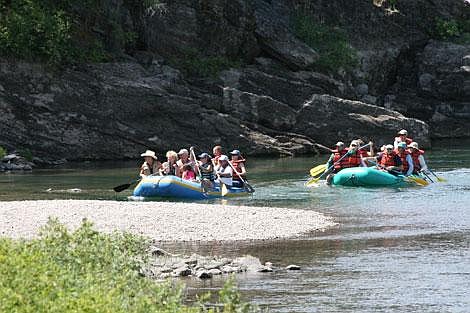 Jason Shueh/Valley Press After a little under four hours of rafting, the Ward family reunion paddled themselves into &#147;The Mouth,&#148; a small inlet about 10 miles west of Plains. Sebastian Black, owner of Paradise Rafting, said it was the largest raft group he&#146;s seen this year.