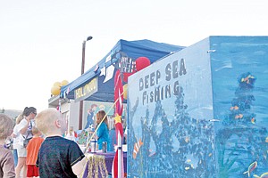 &lt;p&gt;A carnival for the kids (and kids-at-heart) put on by the Loggers for Life team featured this deep-sea fishing attraction, where volunteers would help kids &#147;catch&#148; a prize with a clothespin lure.&lt;/p&gt;