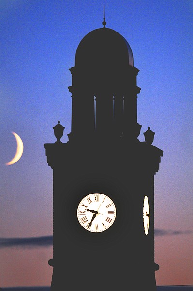 &lt;p&gt;The moon hangs low in the sky Tuesday evening beyond the clock
tower in Whitefish.&lt;/p&gt;