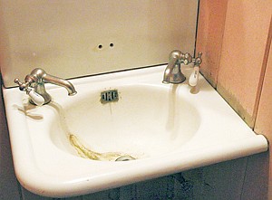 &lt;p&gt;Old fashioned sink in the men's restroom.&lt;/p&gt;