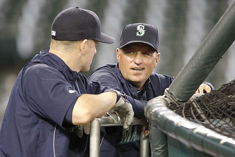 &lt;p&gt;Seattle interim manager Daren Brown, right, talks with Russell Branyan during batting practice before Monday's game against Oakland. The Mariners won 3-1.&lt;/p&gt;