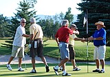 Golfers raise money for high school program