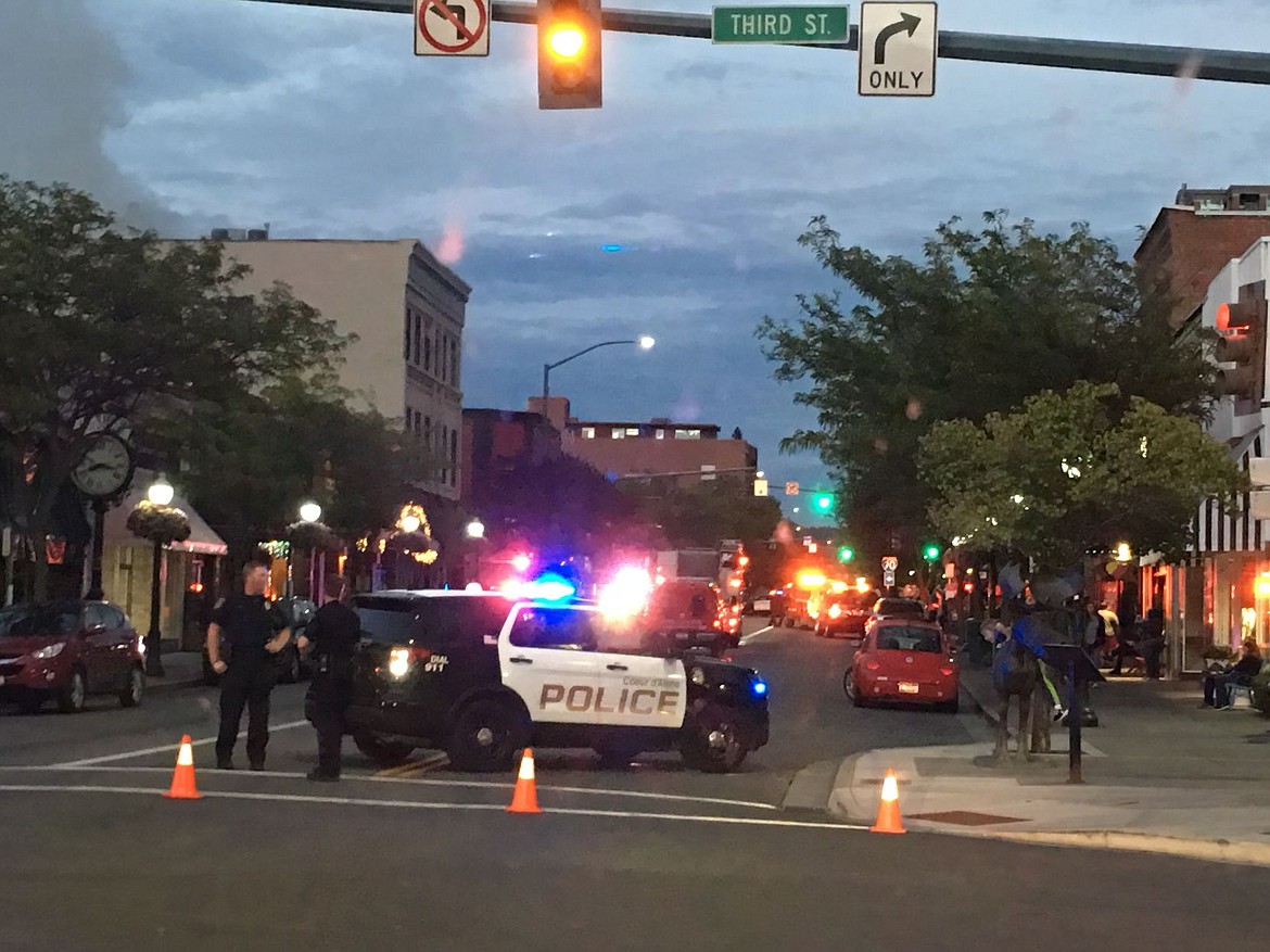 &lt;p&gt;Police block traffic as firefighters work on a fire in a three-story building in the 300 block of Sherman Avenue. The Beacon Pub is on the first floor.&lt;/p&gt;