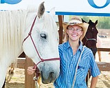 Wrangler heads off griz on trail ride