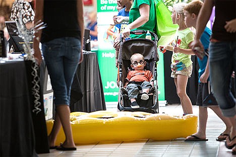 &lt;p&gt;Zacharya Martin, 1, wears a pair of disguise glasses Saturday afternoon at the Back to School Fair in Silver Lake Mall in Coeur d&#146;Alene. The fair provided parenting resources, activities and carnival games.&lt;/p&gt;