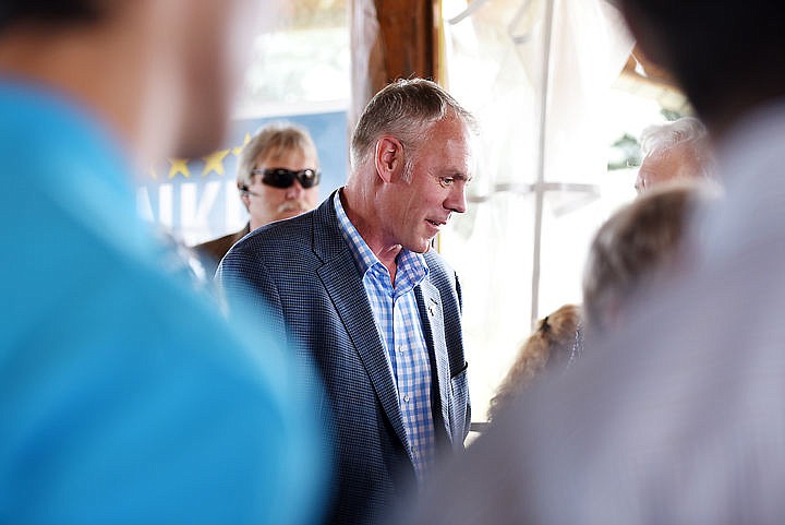 <p>Ryan Zinke talks with audience members at the beginning of the Zinke/Gowdy grassroots rally on Tuesday afternoon, August 9, at the Majestic Valley Arena Pavilion. (Brenda Ahearn/Daily Inter Lake)</p>