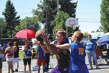 &lt;p class=&quot;p1&quot;&gt;Cabe Foreman-Webster of the Pirates battles through a pair of Kootenai Klash defenders to get to the basket on Saturday in Boys 7th-8th grade competition.&lt;/p&gt;