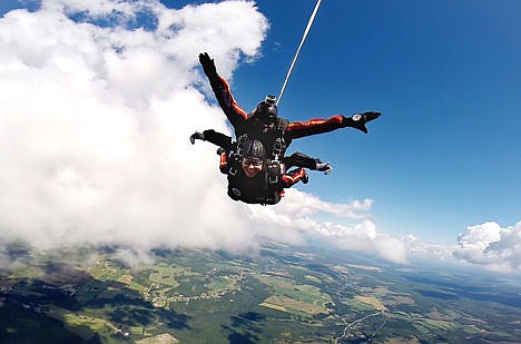 &lt;p&gt;U.S. Army Staff Sgt. Travis Mills, bottom, makes a parachute jump with the help of an All Veterans Parachute Team member over Northern Maine, on Saturday. U.S. Army Staff Sgt. Travis Mills, bottom, makes a parachute jump with the help of an All Veterans Parachute Team member over Northern Maine, on Saturday.&lt;/p&gt;