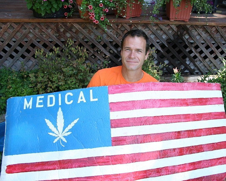 &lt;p&gt;Russ Britt displaying his United States Flag with the Medical
Marijuana insignia.&lt;/p&gt;