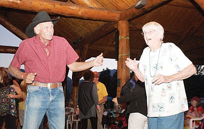 &lt;p&gt;Dennis Borgen of Columbia Falls, left, and Libby's Hazel Scott (86) dance to the music of Stacy Jones Friday during the seventh annual Riverfront Blues Festival.&lt;/p&gt;