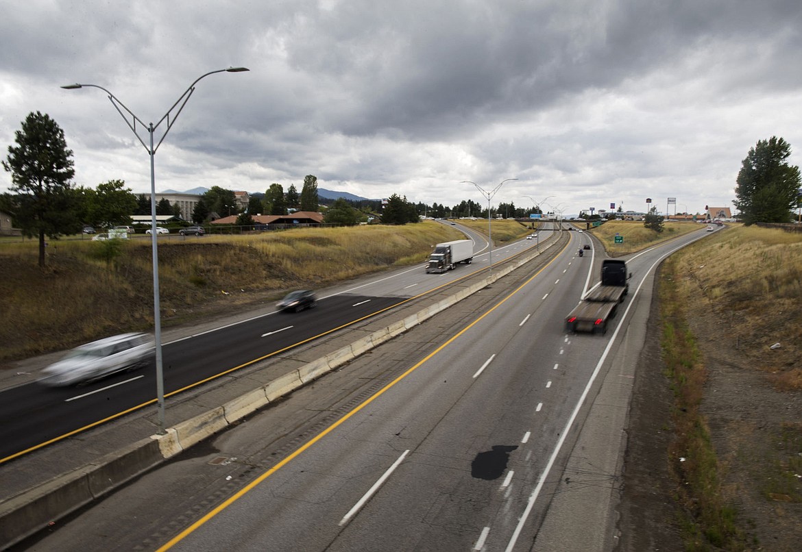 &lt;p&gt;A semi-truck exits Interstate 90, Wednesday, to Highway 95 using exit 12. Many trucks using I-90 have to exit in Coeur d'Alene because they can't go under bridges because some trailers exceed the maximum heights of bridges in Coeur d'Alene.&lt;/p&gt;