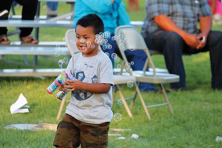 Bubble guns were popular items at American Fiesta Amistad in Othello Saturday.