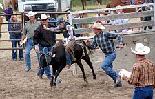 Trae Garcia launches from the chute during the Southwest Youth Rodeo last Sunday in Ronan.