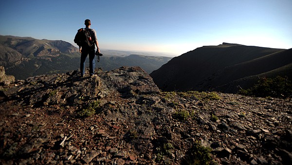 &lt;p&gt;Gavin Lommatsch of Columbia Falls, stops to enjoy the view along Scenic Point Trail on Sunday, July 29, in East Glacier.&lt;/p&gt;