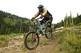 Riders cut through the fog at Grizzly Downhill race