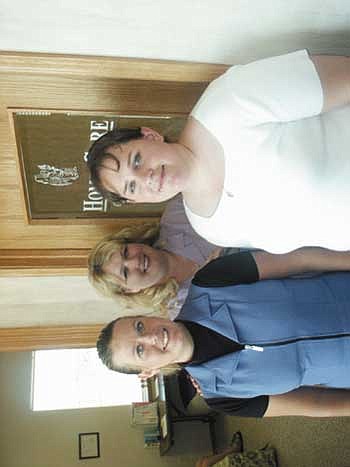 PHOTOS: Home Care of Washington lead supervisor Brandie Sombath, regional director Teresa Michielli and secretary Tifani Kinser stand outside their office Wednesday afternoon. The office opened in July.