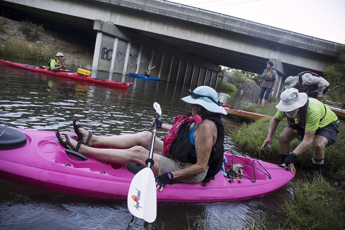 &lt;p&gt;Dwight McCain, right, President of the Coeur d'Alene Canoe and Kayak Club helps Dore Griffith put in to the Spokane River Thursday evening. The club gets together every Thursday at 6 p.m. to paddle local rivers and lakes during the summer months.&lt;/p&gt;