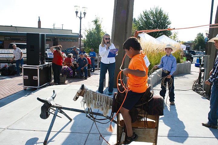 Rodolfo Beck gets ready to rope a recalcitrant calf during the annual Cowboy Breakfast. The breakfast is the traditional kickoff for the Moses Lake Roundup and the Grant County Fair.