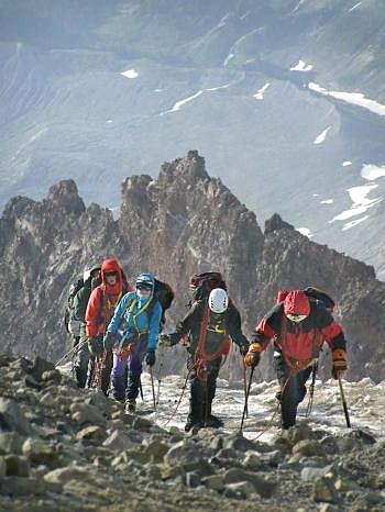 Ten climbers from Whitefish, members of Venture Crew 2917, climbed Mount Rainier in Washington state on an Aug. 1-4 expedition. Venturing is an offshoot of the Boy Scouts organization. Pictured here, from the front of the line to the back, are Mike McNamara, Chris McNamara, Jessie Mazur, Matt Kennedy and Ben Conard as they make their way up &quot;Disappointment Cleaver.&quot; Conard, one of the adult organizers of the trip for youths aged 15-20, said the expedition went &quot;flawlessly.&quot; (Caitlin Caltabiano photo)