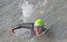 A swimmer takes a stroke during Water Daze last Saturday in Polson.