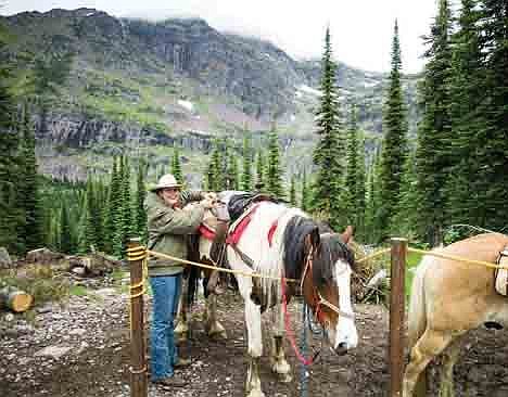 &lt;p&gt;Swan Mountain Outfitter guide Brittany Finch unloads a horse at Sperry Chalet. Swan Mountain Outfitter guide Brittany Finch unloads a horse at Sperry Chalet.&lt;/p&gt;