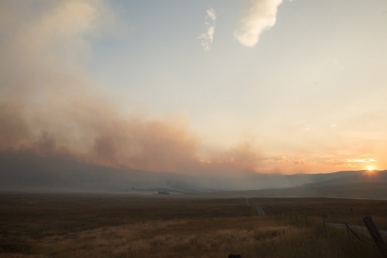 &lt;p&gt;Patrick Cote/Daily Inter Lake The West Garceau Fire burns approximately 2,000 acres Tuesday evening near Big Arm. Fifteen people from the Irvin Flats area were evacuated and are currently staying at the Big Arm Fire Station. Tuesday, Aug. 14, 2012 in Big Arm, Montana.&lt;/p&gt;