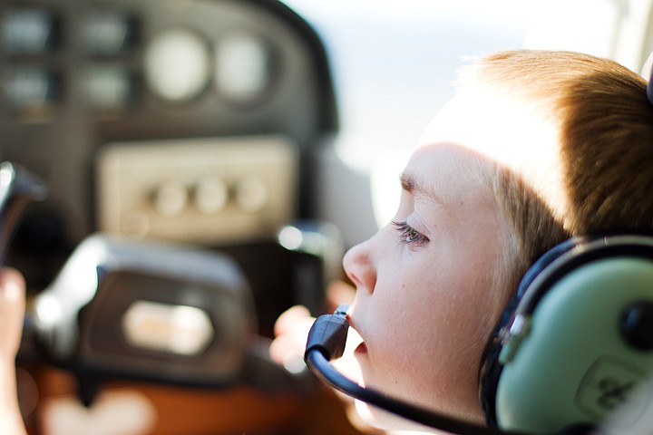 &lt;p&gt;SHAWN GUST/Press Teague Caro looks out the window while experiencing his first airplane ride with the SOARING program.&lt;/p&gt;