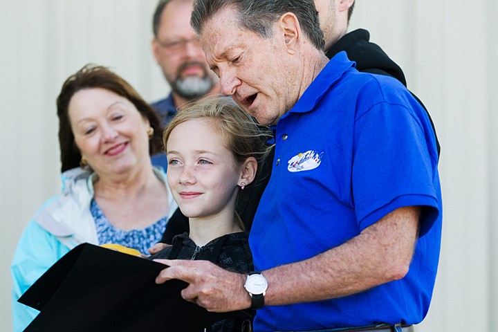 &lt;p&gt;SHAWN GUST/Press Madeline Caro reacts as SOARING president Joe McCarron outlines her accomplishments during a presentation at the Coeur d'Alene Airport-Pappy Boyington Field.&lt;/p&gt;