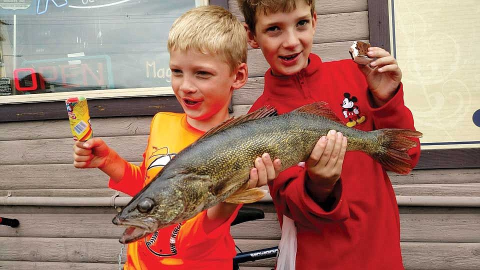 Families renting our pontoon boats have been anchoring at the mouth of Frenchman&#146;s Wasteway and catching perch, crappie, walleye, bass, bullheads and catfish. Pictured here are Tyler and Brad of Everett, Wash. with a nice walleye caught while out on a pontoon boat with their family.