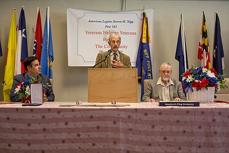 &lt;p&gt;Idaho Congressman Raul Labrador, left, and retired U.S. Army Major Larry Moore, right, listen to retired U.S. Army Colonel Ronald Leonard speak of Michael Atwell's bravery and achievements in the Vietnam War at Atwell's Silver Star Medal ceremony Wednesday at the American Legion Post 143 in Post Falls. Atwell received the Silver Star Medal, the United State's third highest military combat decoration for valor, for his acts of heroism from November 20 to November 23. 1967, in Vietnam.&lt;/p&gt;