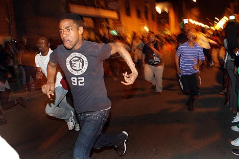 &lt;p&gt;Young people run down South Street in Philadelphia during a flash mob incident that involved thousands and closed the street to traffic from Front Street to Broad on March 20.&lt;/p&gt;